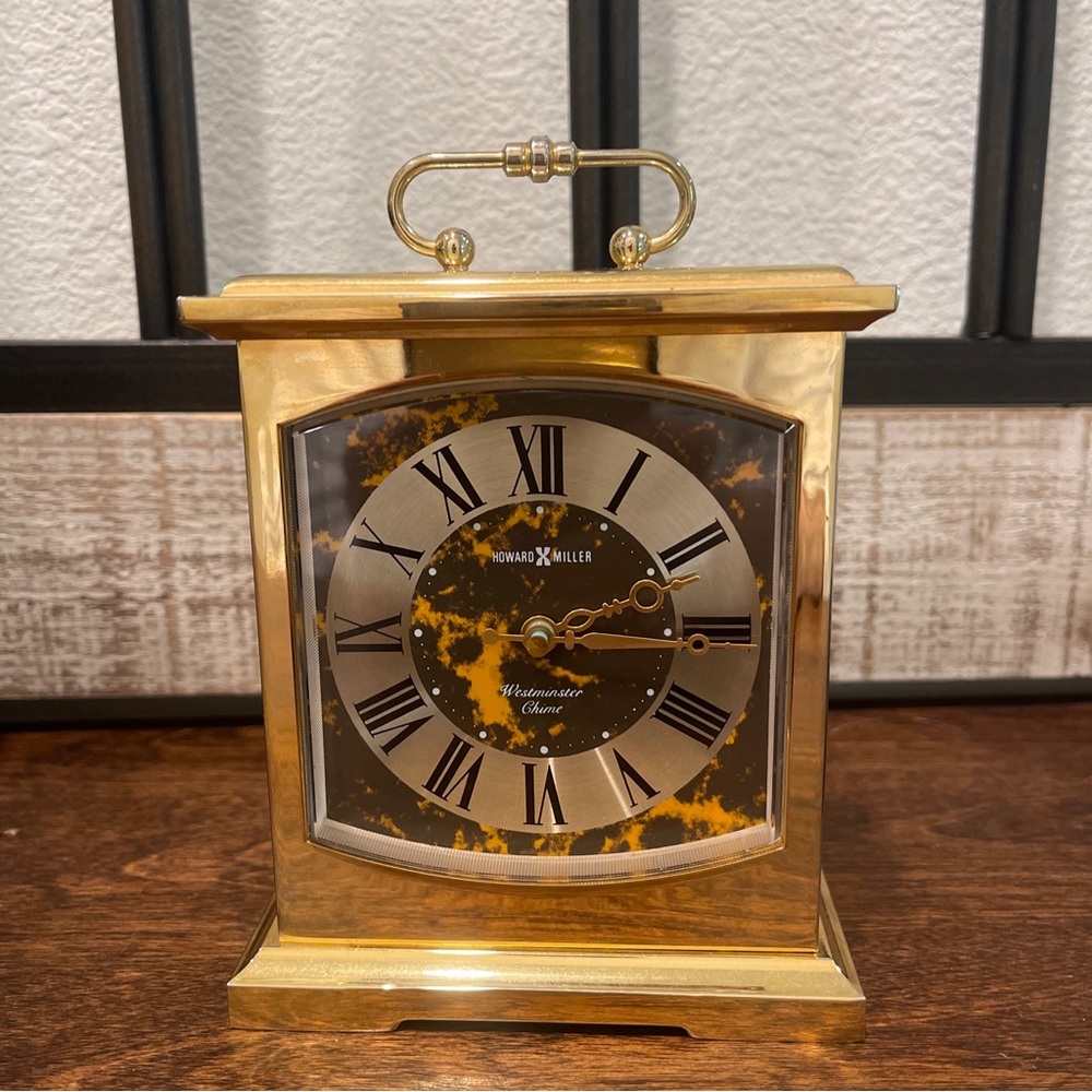 Howard Miller Brass Clock Mantle Westminster Chimes. 
Model 612737 new battery